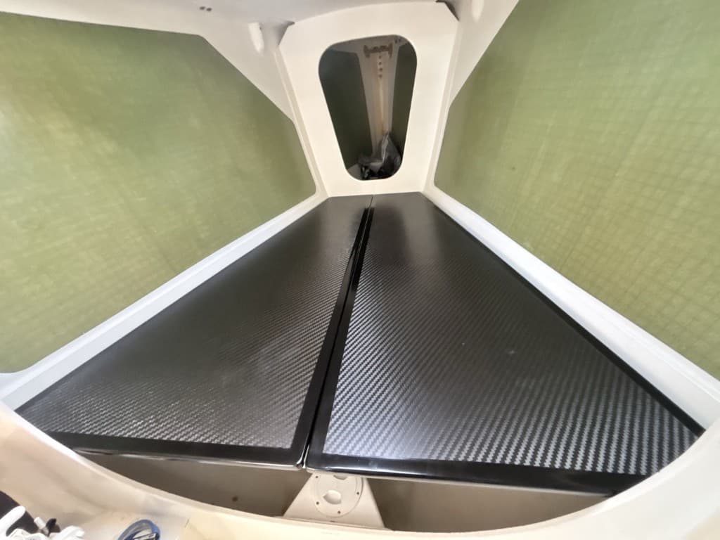 Gloss carbon panels in a yacht interior