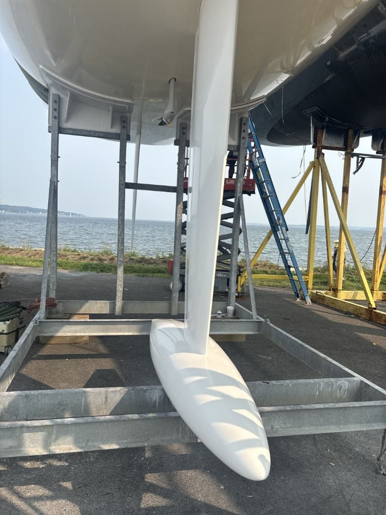 Performance yacht keel and bulb on a cradle at the boatyard